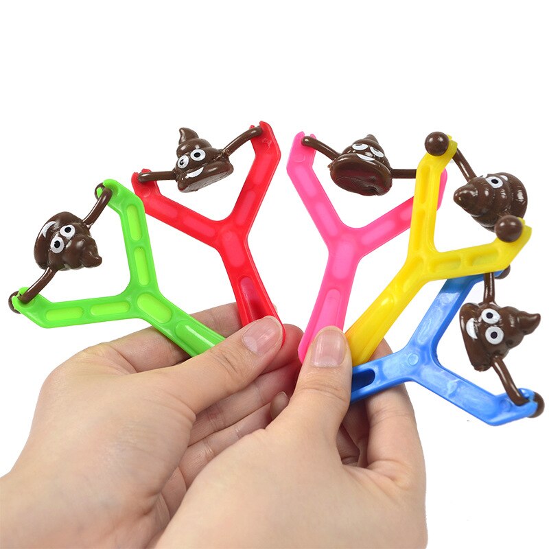 SlingyShots™ - Smiley Pupse Schleuder Spielzeug